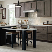 Worthen kitchen cabinets in PureStyle Elk with a Trystan Maple Black island
