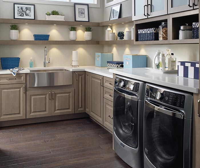 Laundry room featuring Davis cabinets in Maple Seal and open shelving