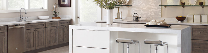 Contemporary kitchen featuring high gloss white and woodgrain laminate cabinets