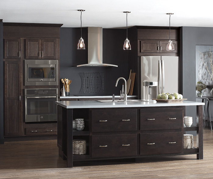 dark kitchen cabinet display with white island countertop